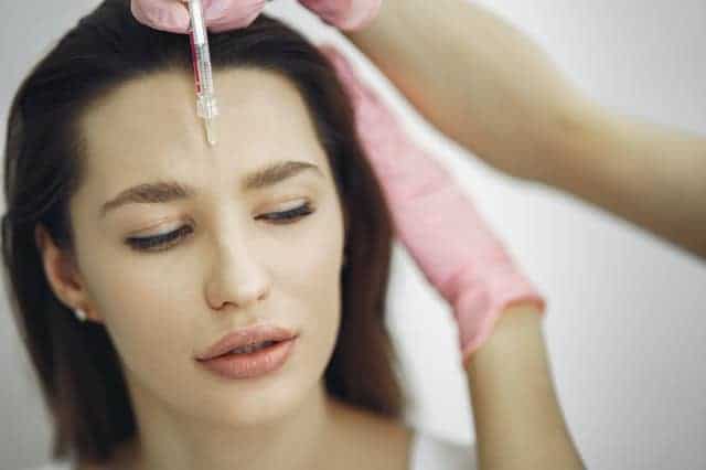 woman getting neuromodulator