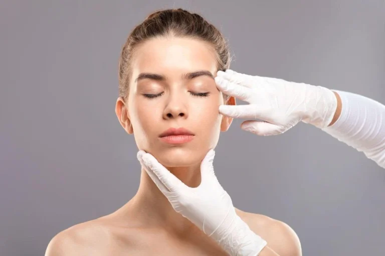 What is a mini facelift? - picture of a female getting a consultation for cosmetic surgery