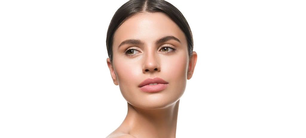 Beautiful woman received a facelift and is modeling her results.