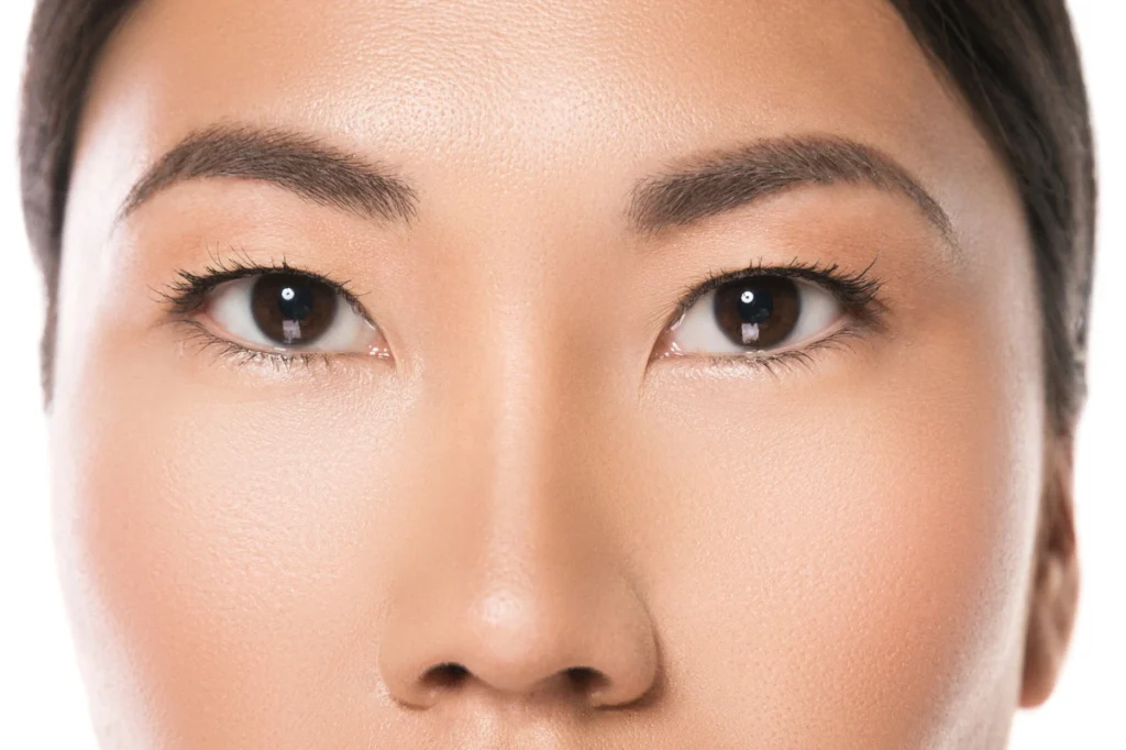 Monolid Eyes vs Double Eyelids - close up of female asian eyes