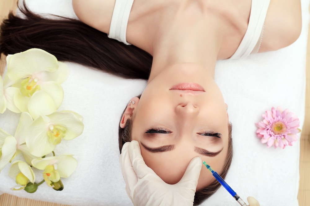 Woman's Face Receiving Skin Lifting Injections