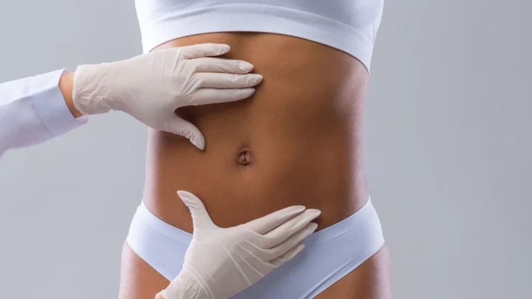 Is Liposuction Good For Belly Fat Removal? - female getting consultation for belly fat removal
