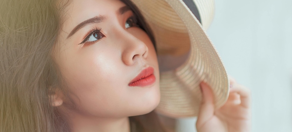 Young woman looking at the sky